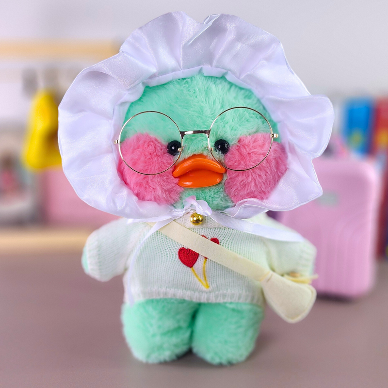 Pato Lalafanfan Verde Paper Duck de pelúcia com roupas e acessórios blusão branco corações com touca bebê