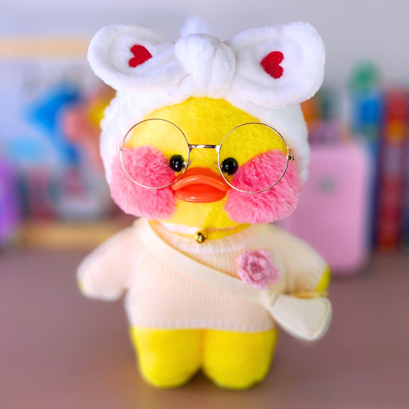 Pato Lalafanfan Amarelo Paper Duck de pelúcia com roupas e acessórios blusão branco flor com faixa coração