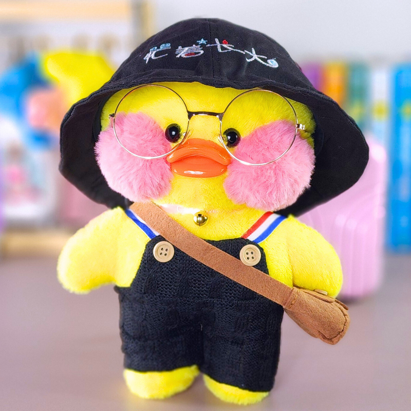 Pato Lalafanfan Amarelo Paper Duck de pelúcia com roupas e acessórios macacão preto com chapéu