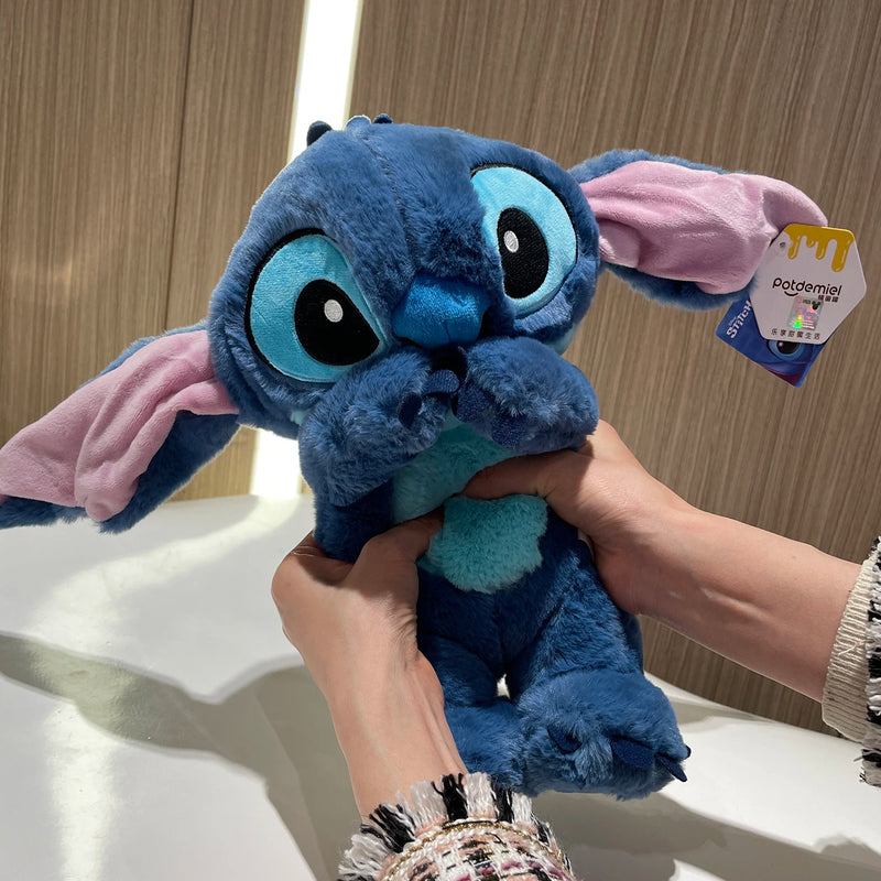 Stitch de pelúcia que mexe as orelhas