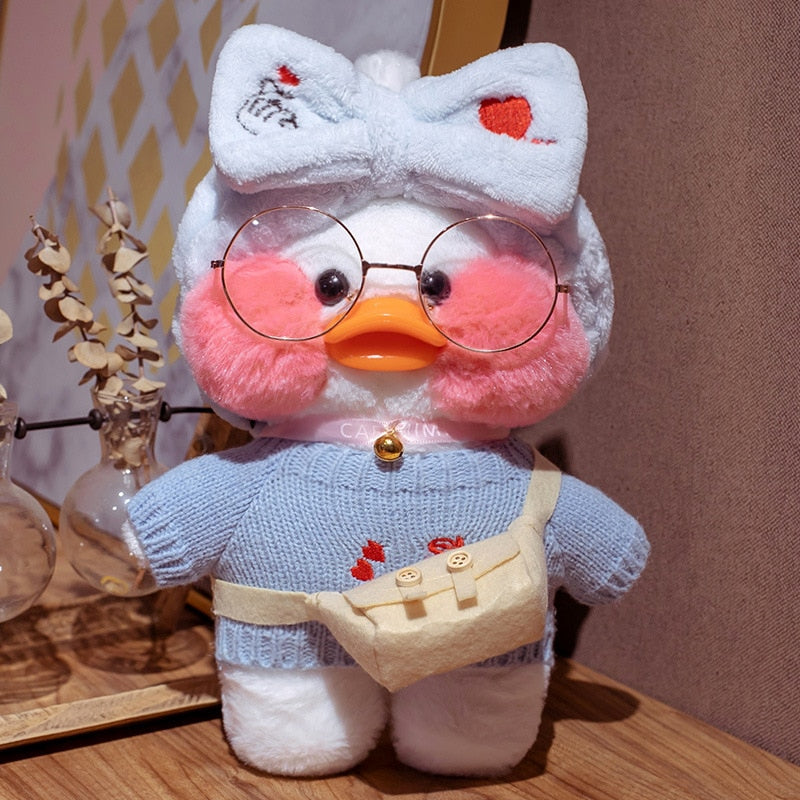 Pato Lalafanfan Branco Paper Duck de pelúcia com roupas e acessórios Conjunto azul dedos de coração - Pronta entrega