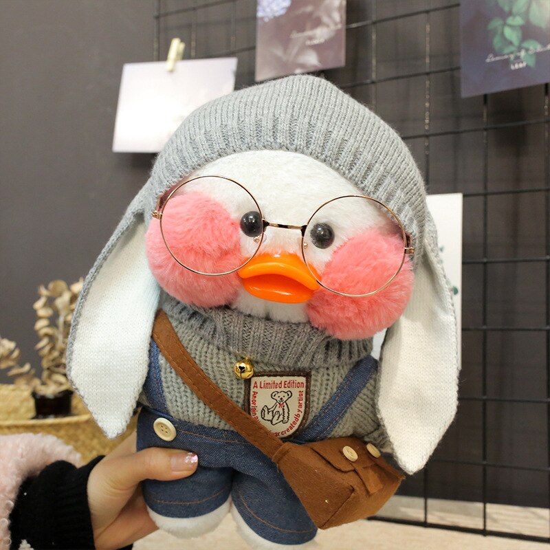 Pato Lalafanfan Cinza Paper Duck de pelúcia com roupas e acessórios Co