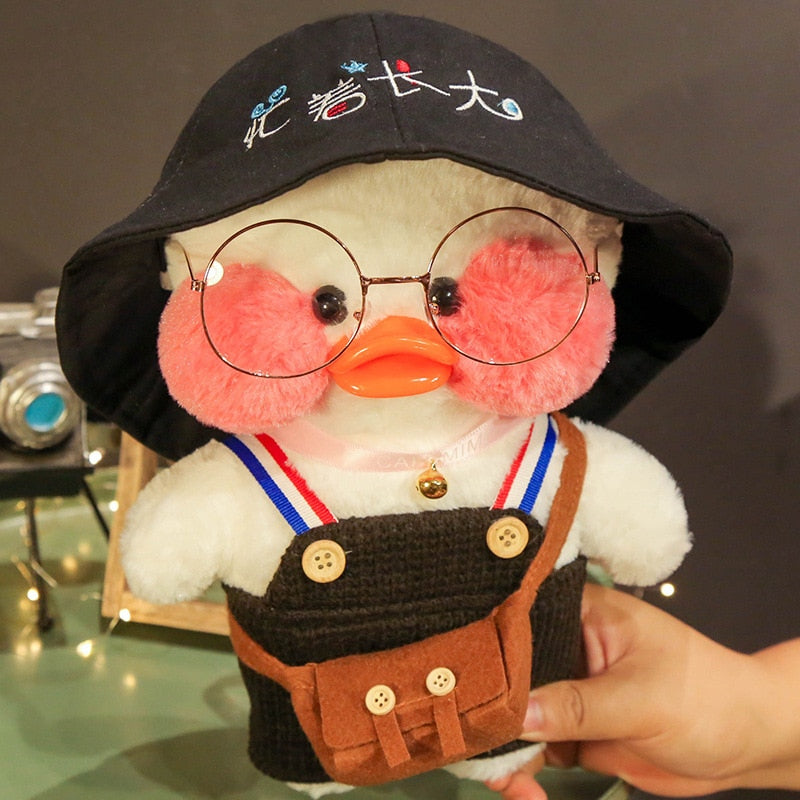 Pato Lalafanfan Branco Paper Duck de pelúcia com roupas e acessórios Conjunto jardineira preta com chapéu - Pronta entrega