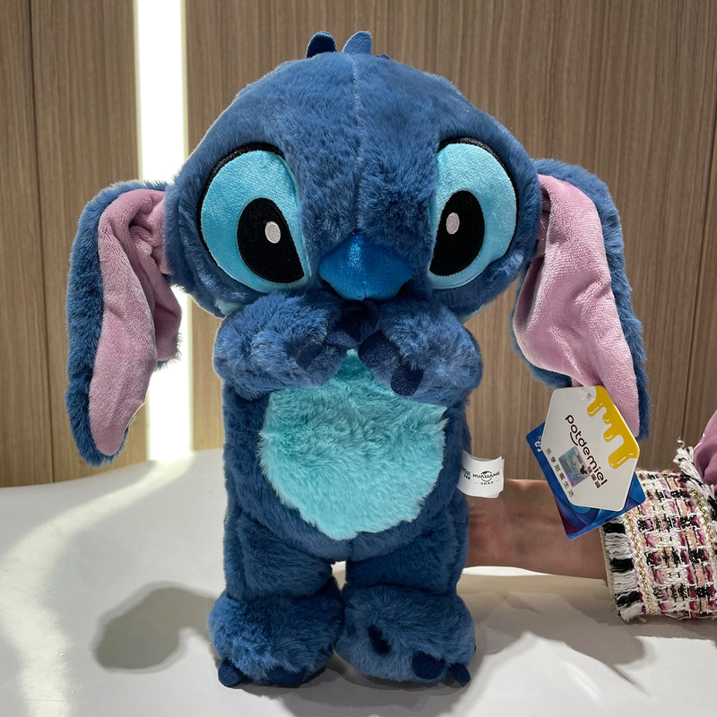 Stitch de pelúcia que mexe as orelhas