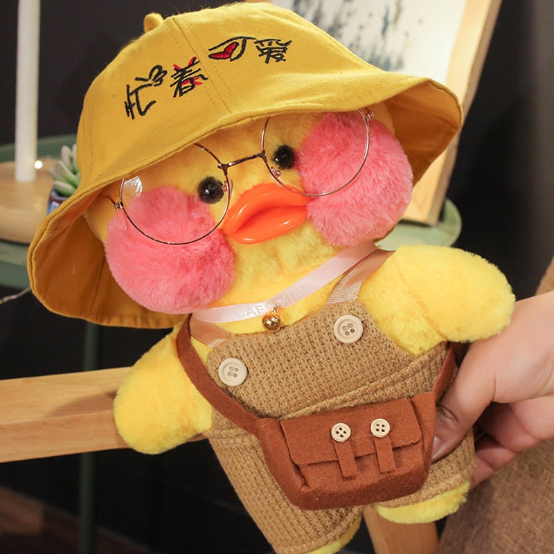 Pato Lalafanfan Amarelo Paper Duck de pelúcia com roupas e acessórios Conjunto jardineira com chapéu amarelo