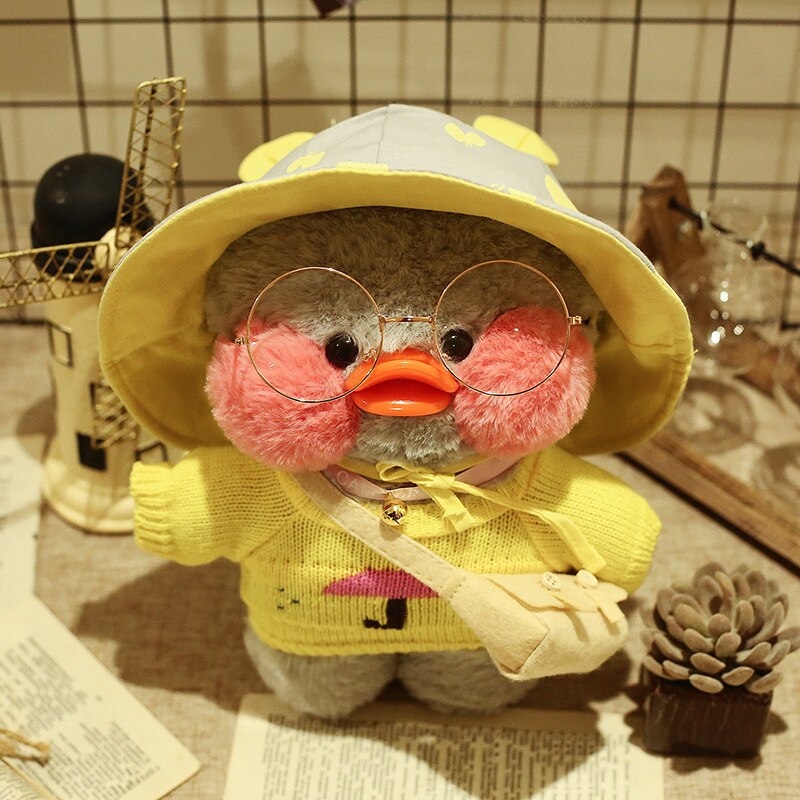 Pato Lalafanfan Cinza Paper Duck de pelúcia com roupas e acessórios Conjunto chuva com chapéu amarelo